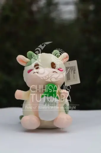 Peluche Vaca tetero verde